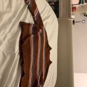 this brown and blue,pink and white strip jacket I’m in love with this turtleneck